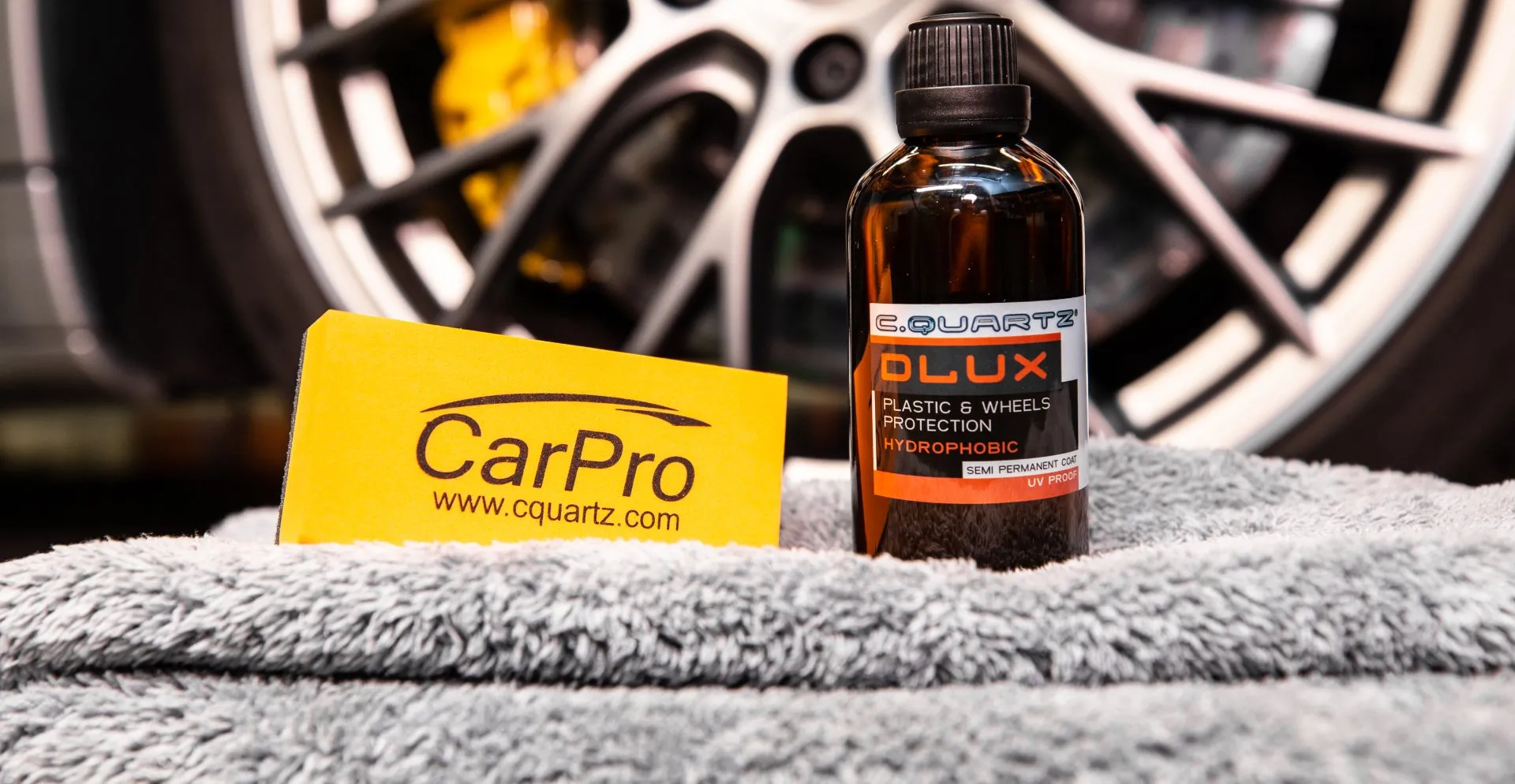 CarPro DLUX plastic and wheels protection coating